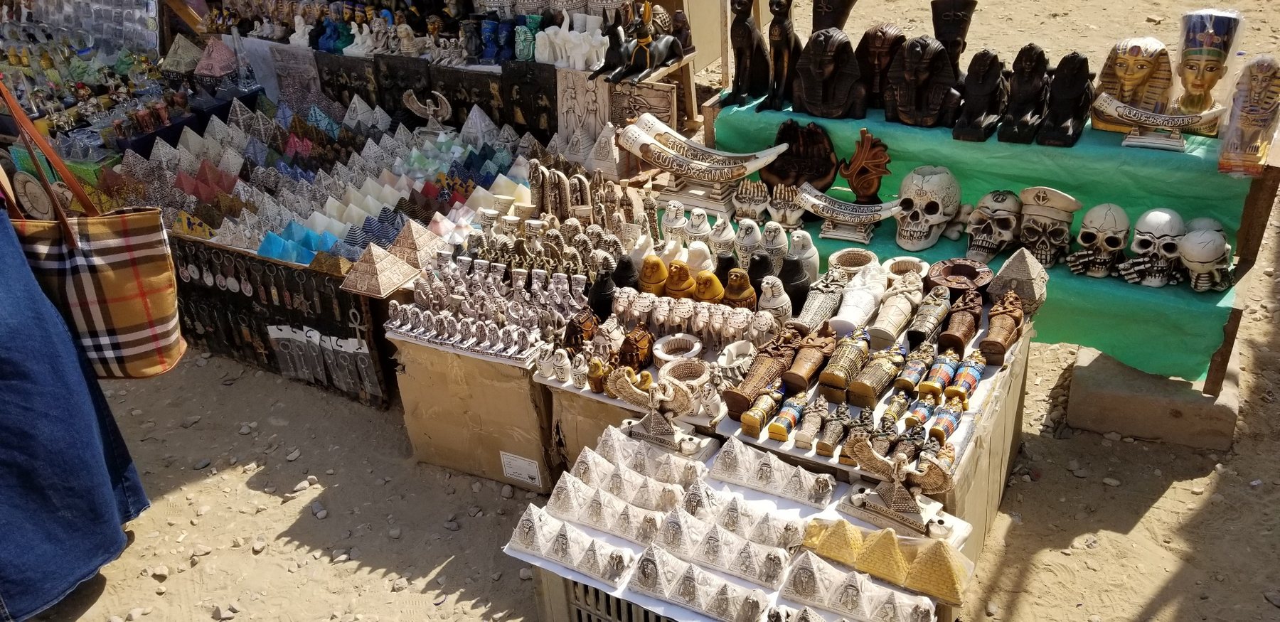 Egyptian souvenirs and miniature pyramids at a market near Giza