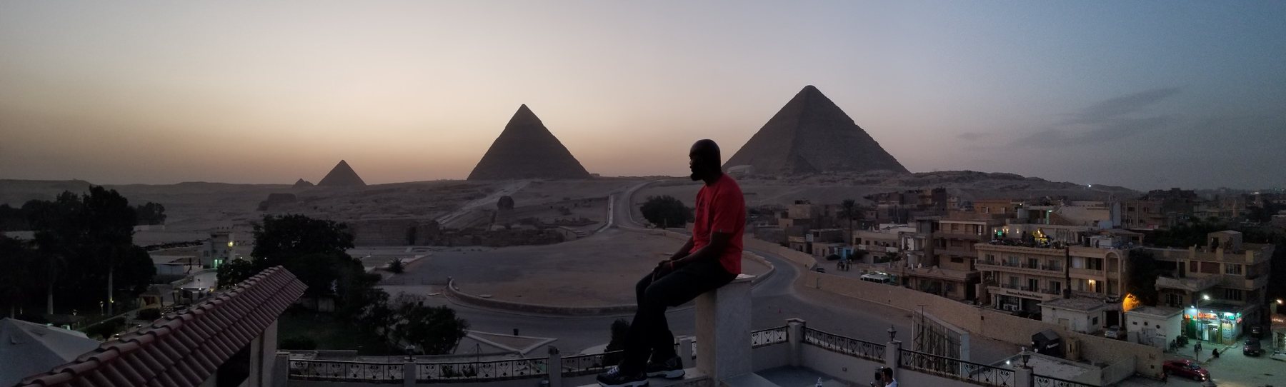 Darnell overlooking the pyramids after sunset