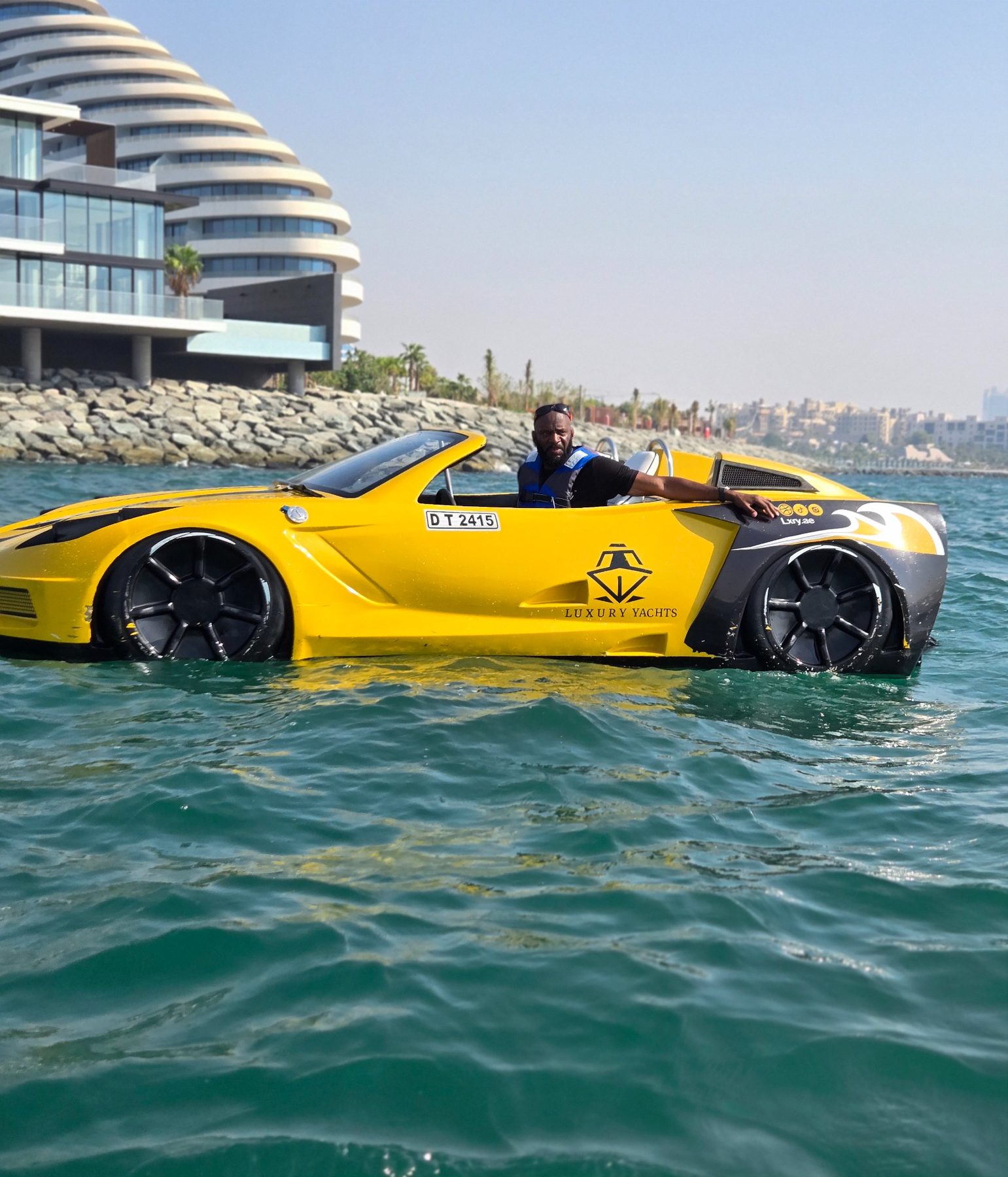 Yellow water car near the Burj Al Arab