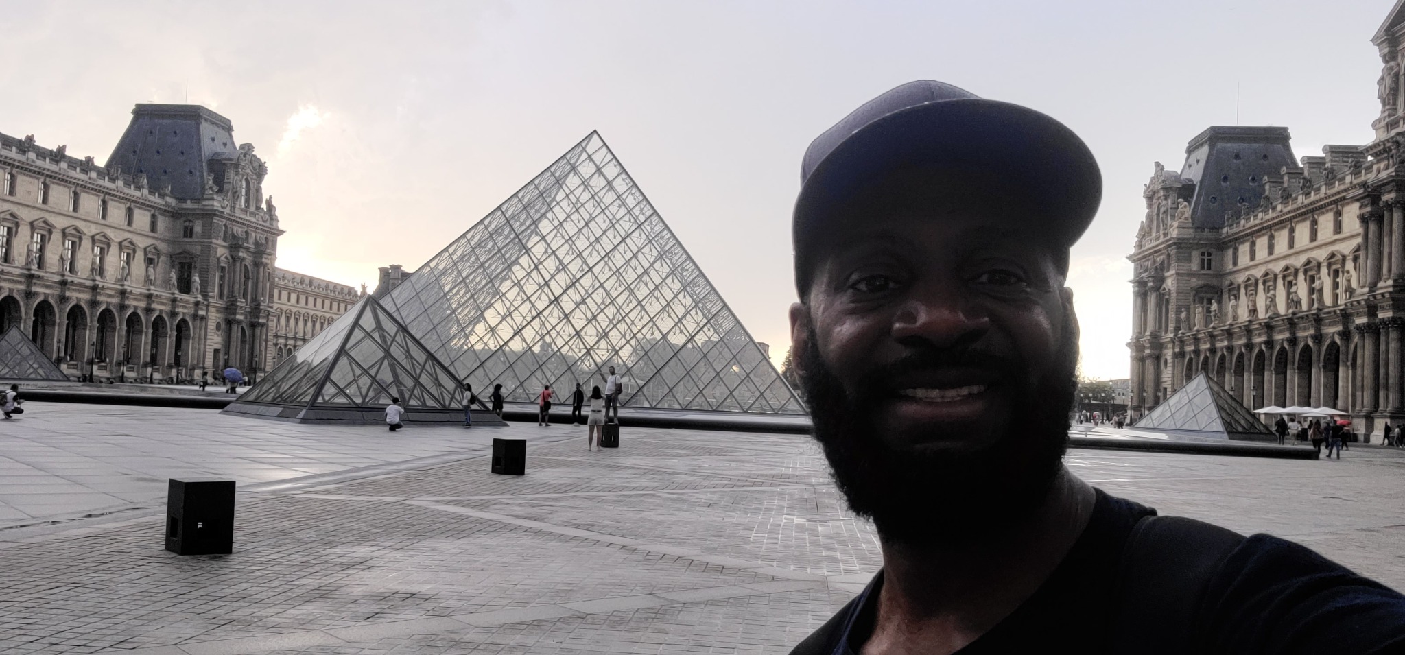Darnell at the Louvre courtyard