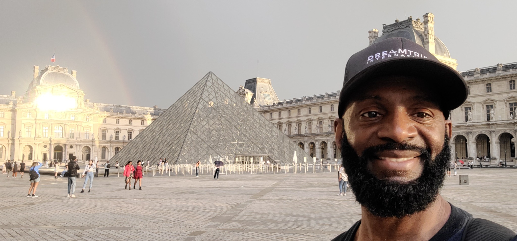 Darnell at the Louvre Pyramid in Paris