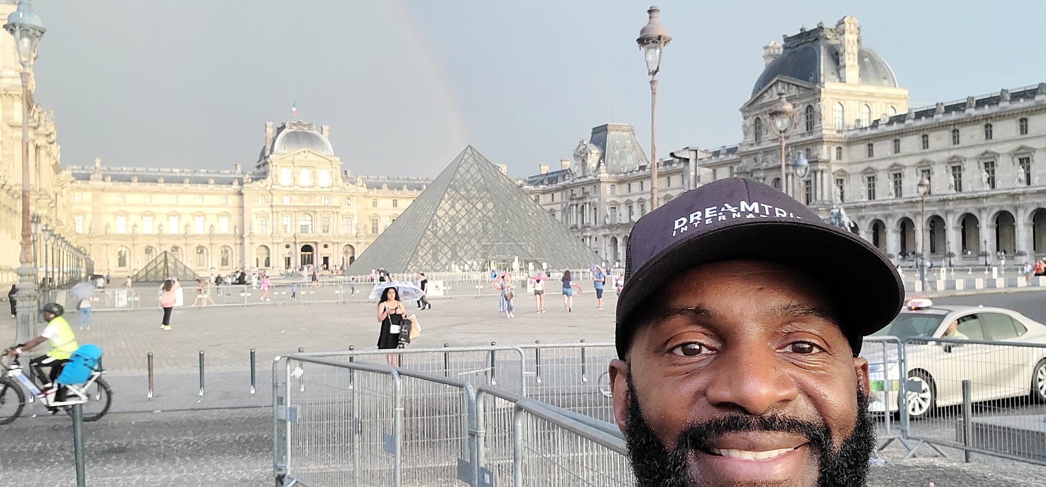 Darnell with the Louvre Pyramid behind him